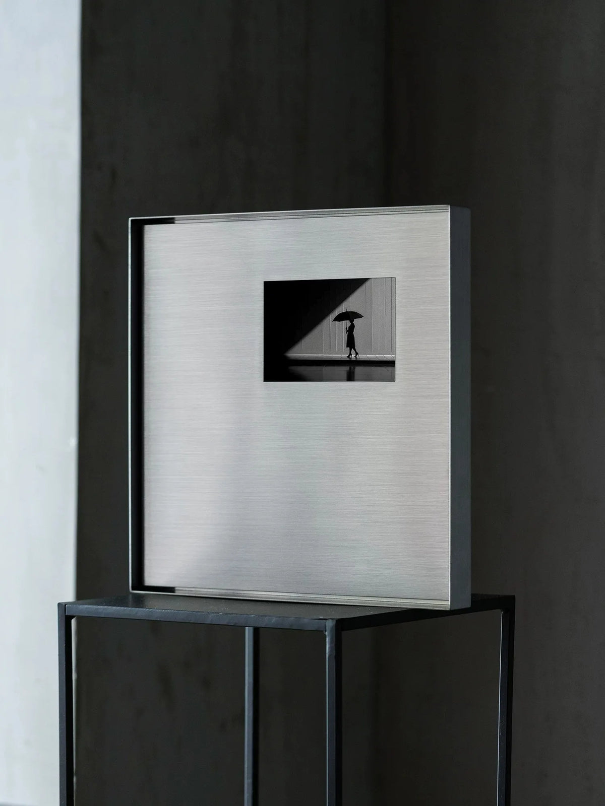 Square Stainless Steel Picture Frame in a modern living room