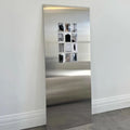 Frameless Stainless Steel Wall Art styled in a modern living room