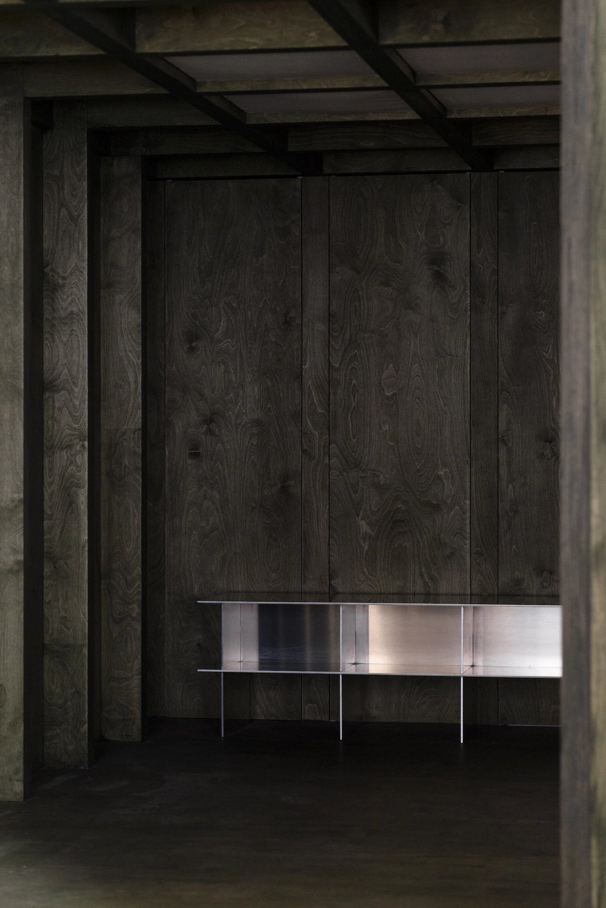 Glossy Metal Minimalist TV Stand shown in a contemporary home