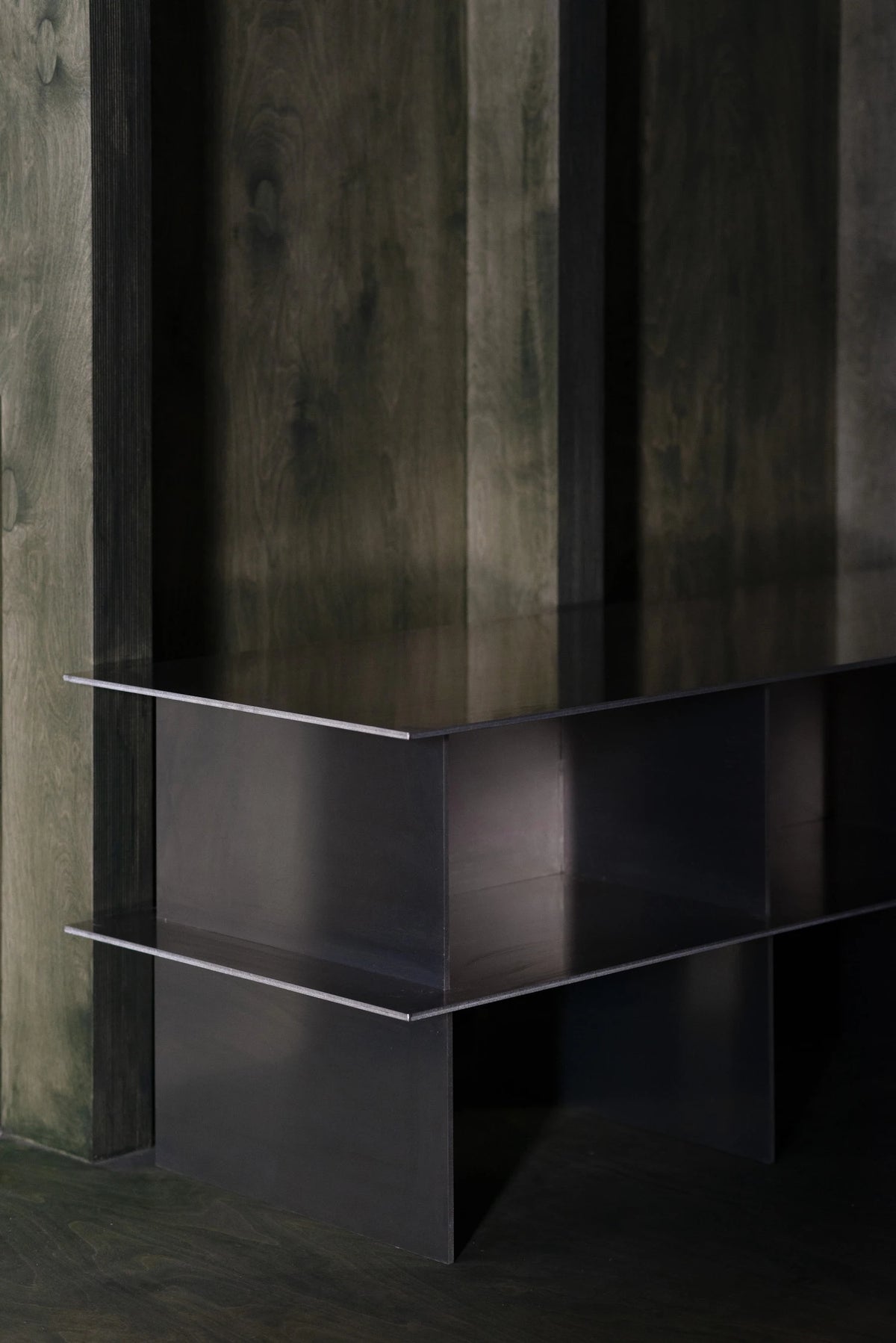 Glossy Metal Minimalist TV Stand styled in a modern living room