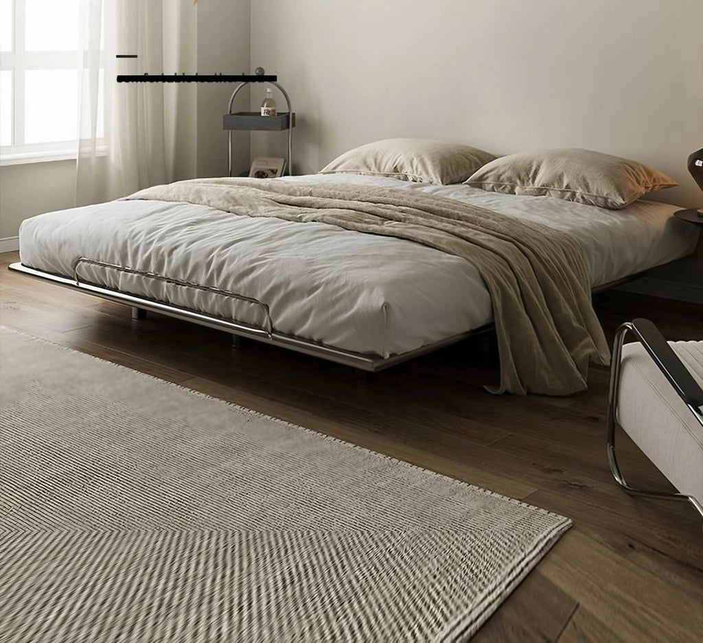Floating Stainless Steel Bed Frame in a bright, styled room