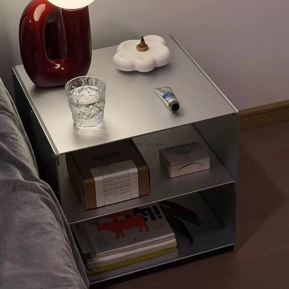 Bauhaus Modular Stainless Steel Shelf as a bedside nightstand