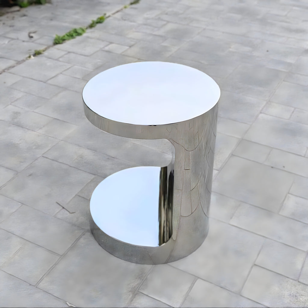 Silver C-shaped side table, outdoor view